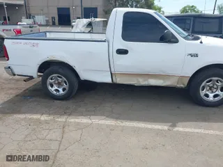 1999 Ford F-150 Work Series with VIN 2FTZF1729XCA83871, listed as a IAAI auction lot 42009506 with 234,988 mi miles. Bid and sale history available at carsss.com. Image 6.
