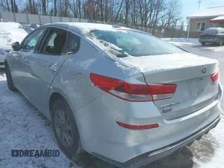 2019 Kia Optima LX z VIN 5XXGT4L3XKG294513, wystawiony jako IAAI lot #41345191 z przebiegiem 101 345 mil mil oraz . Historia ofert i sprzedaży dostępna na DreamBid. Obrazek 3.