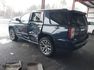 2018 GMC Yukon Denali with VIN 1GKS2CKJ5JR335718, listed as a IAAI auction lot 40991126 with 87,479 mi miles. Bid and sale history available at carsss.com. Image 3.