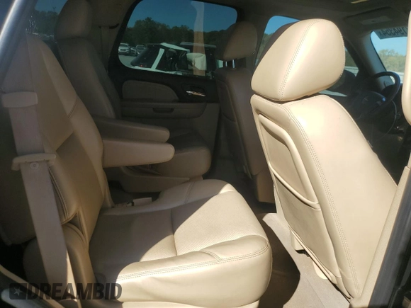 2011 GMC Yukon Denali with VIN 1GKS1EEFXBR121055, listed as a Copart auction lot 77194354 with 98,806 mi miles and Salvage Title. Bid and sale history available at carsss.com. Image 12.