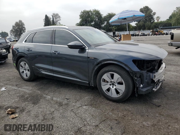 2019 Audi e-tron Premium Plus with VIN WA1LABGE3KB014614, listed as a Copart auction lot 60864165 with 37,718 mi miles and Salvage title. Bid and sale history available at DreamBid. Image 4.