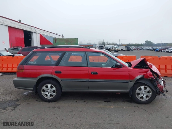 1999 Subaru Legacy Wagon Outback with VIN 4S3BG6852X7649808, listed as a IAAI auction lot 41873182 with 249,996 mi miles. Bid and sale history available at carsss.com. Image 14.