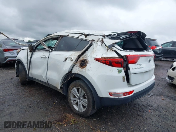 2017 Kia Sportage LX with VIN KNDPM3AC1H7212938, listed as a IAAI auction lot 42015705 with 85,649 mi miles and . Bid and sale history available at DreamBid. Image 3.