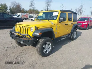 2019 Jeep Wrangler Unlimited Sport S with VIN 1C4HJXDG4KW579364, listed as a IAAI auction lot 41809318 with 22,370 mi miles and . Bid and sale history available at DreamBid. Image 18.