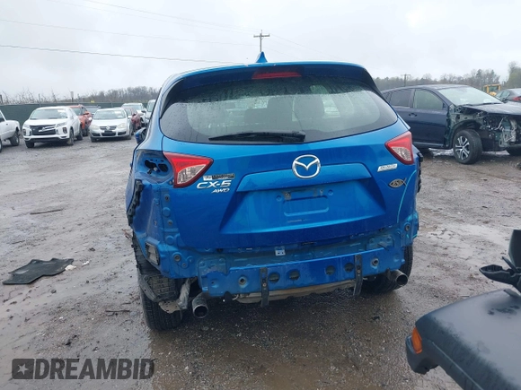 2014 Mazda CX-5 Sport with VIN JM3KE4BE6E0336504, listed as a IAAI auction lot 41961244 with 125,150 mi miles. Bid and sale history available at carsss.com. Image 17.