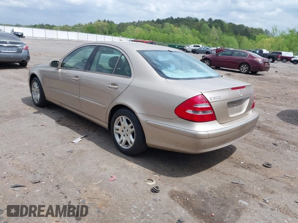 2003 Mercedes-Benz E-Class 3.2L with VIN WDBUF65J23A243178, listed as a IAAI auction lot 41974660 with 134,459 mi miles. Bid and sale history available at carsss.com. Image 3.
