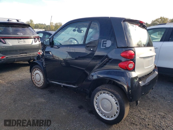 2013 Smart fortwo Passion z VIN WMEEJ9AA1DK717534, wystawiony jako Copart lot #73832094 z przebiegiem Nie podano mil oraz Tytuł czysty. Historia ofert i sprzedaży dostępna na DreamBid. Obrazek 2.