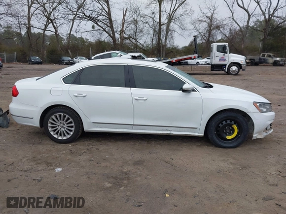 2016 Volkswagen Passat SE z VIN 1VWBS7A30GC013454, wystawiony jako IAAI lot #41477109 z przebiegiem 134 027 mil mil oraz . Historia ofert i sprzedaży dostępna na DreamBid. Obrazek 14.