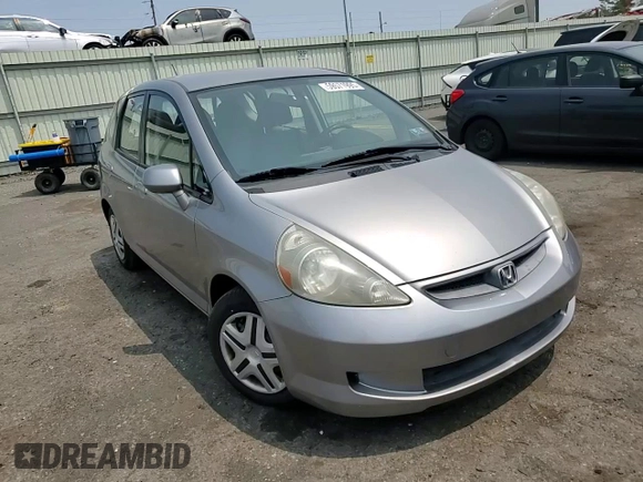 2008 Honda Fit z VIN JHMGD38468S039427, wystawiony jako Copart lot #59571995 z przebiegiem 125 476 mil mil oraz Szkoda całkowita • Salvage title. Historia ofert i sprzedaży dostępna na DreamBid. Obrazek 13.