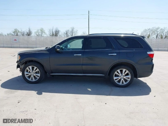 2013 Dodge Durango Crew with VIN 1C4SDHDT5DC637535, listed as a IAAI auction lot 41867982 with 162,569 mi miles. Bid and sale history available at carsss.com. Image 14.