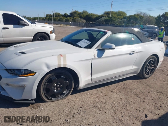 2019 Ford Mustang EcoBoost z VIN 1FATP8UH8K5162526, wystawiony jako IAAI lot #41846704 z przebiegiem 84 527 mil mil oraz . Historia ofert i sprzedaży dostępna na DreamBid. Obrazek 18.