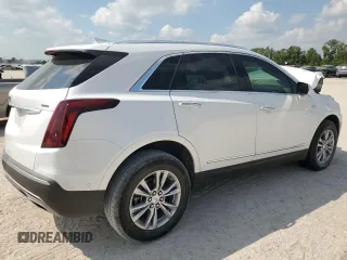 2023 Cadillac XT5 FWD Premium Luxury with VIN 1GYKNCRS7PZ150378, listed as a Copart auction lot 71792184 with 21,631 mi miles and Salvage Title. Bid and sale history available at carsss.com. Image 3.