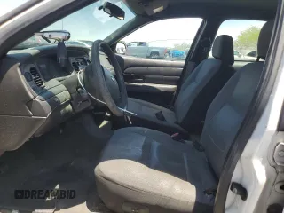 2010 Ford Police Interceptor с VIN 2FABP7BVXAX135498, выставлен на аукционе Copart как лот 59106175 с пробегом Не указан миль и Чистый • Clean title. История ставок и продаж доступна на DreamBid. Изображение 7.