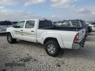 2014 Toyota Tacoma PreRunner with VIN 3TMKU4HN7EM040312, listed as a Copart auction lot 87420864 with 68,853 mi miles and Salvage title. Bid and sale history available at DreamBid. Image 2.