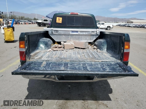 1999 Toyota Tacoma z VIN 4TANL42N3XZ501186, wystawiony jako Copart lot #50843715 z przebiegiem 323 347 mil mil oraz Nie do naprawy • Non repairable. Historia ofert i sprzedaży dostępna na DreamBid. Obrazek 6.