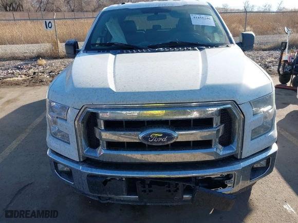 2015 Ford F-150 XLT w/HD Payload Pkg with VIN 1FTFW1EG7FFB09470, listed as a IAAI auction lot 41455246 with 152,766 mi miles. Bid and sale history available at carsss.com. Image 12.