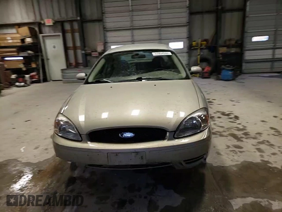 2004 Ford Taurus SE with VIN 1FAFP53U74G122231, listed as a Copart auction lot 42904044 with 116,851 mi miles and Salvage Title. Bid and sale history available at DreamBid. Image 11.