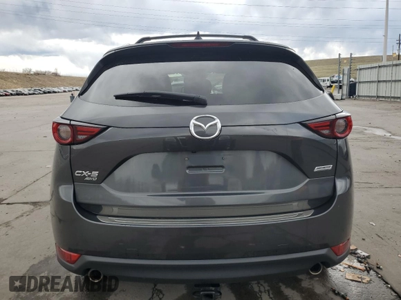 2017 Mazda CX-5 Grand Touring with VIN JM3KFBDL4H0163339, listed as a Copart auction lot 50566495 with 83,453 mi miles and Salvage Title. Bid and sale history available at carsss.com. Image 6.
