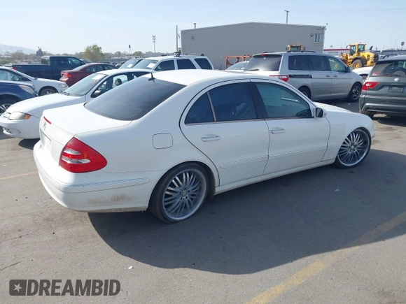 2003 Mercedes-Benz E-Class 3.2L with VIN WDBUF65J63A233107, listed as a IAAI auction lot 42004763 with 151,327 mi miles. Bid and sale history available at carsss.com. Image 4.