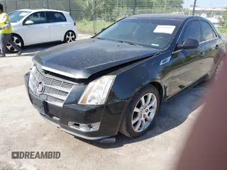2008 Cadillac CTS RWD w/1SA with VIN 1G6DJ577180141687, listed as a IAAI auction lot 41999393 with 323,361 mi miles. Bid and sale history available at carsss.com. Image 2.