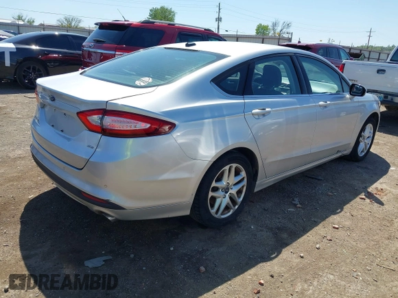 2014 Ford Fusion SE with VIN 1FA6P0H77E5400628, listed as a IAAI auction lot 42001344 with 192,511 mi miles and . Bid and sale history available at DreamBid. Image 4.