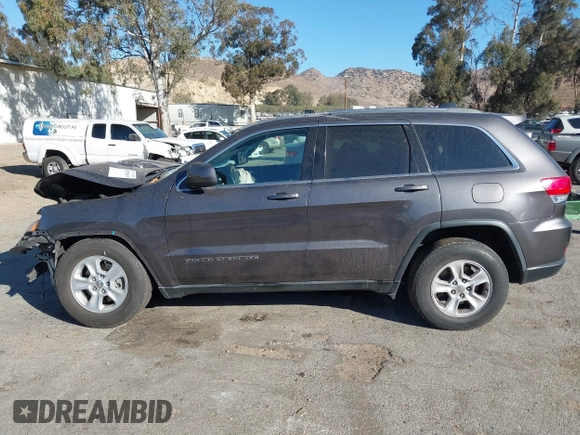2017 Jeep Grand Cherokee Laredo with VIN 1C4RJEAG8HC944037, listed as a IAAI auction lot 41299619 with 140,405 mi miles. Bid and sale history available at carsss.com. Image 14.