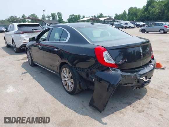 2013 Lincoln MKS EcoBoost with VIN 1LNHL9FT3DG602190, listed as a IAAI auction lot 42483472 with 63,238 mi miles and . Bid and sale history available at DreamBid. Image 3.