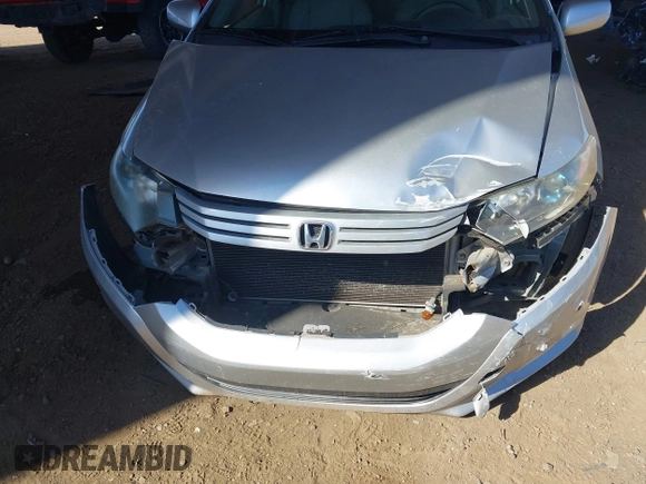 2010 Honda Insight LX z VIN JHMZE2H53AS007016, wystawiony jako IAAI lot #42096274 z przebiegiem 173 519 mil mil oraz . Historia ofert i sprzedaży dostępna na DreamBid. Obrazek 6.