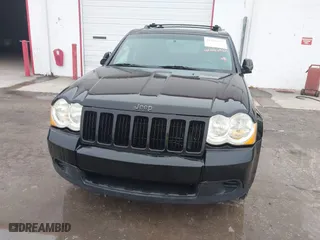 2009 Jeep Grand Cherokee Laredo with VIN 1J8GS48K39C549136, listed as a IAAI auction lot 41446925 with 162,639 mi miles. Bid and sale history available at carsss.com. Image 6.