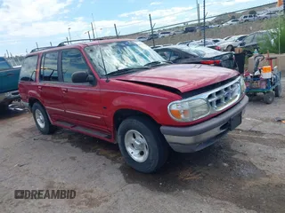 1996 Ford Explorer XLT with VIN 1FMDU32P9TZA66446, listed as a IAAI auction lot 42643571 with 174,927 mi miles and . Bid and sale history available at DreamBid. Image 1.