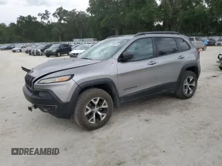 2015 Jeep Cherokee Trailhawk z VIN 1C4PJMBS2FW649175, wystawiony jako Copart lot #57909135 z przebiegiem 149 742 mil mil oraz Szkoda całkowita • Salvage title. Historia ofert i sprzedaży dostępna na DreamBid. Obrazek 1.
