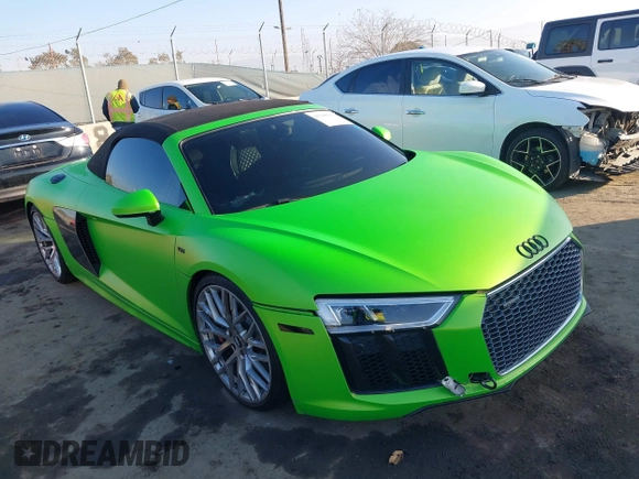 2017 Audi R8 z VIN WUAVACFX5H7903923, wystawiony jako IAAI lot #41348191 z przebiegiem 53 883 mil mil oraz . Historia ofert i sprzedaży dostępna na DreamBid. Obrazek 1.