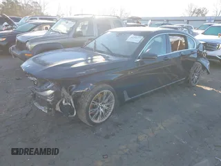 2016 BMW 7 Series 740i z VIN WBA7E2C55GG548125, wystawiony jako IAAI lot #41351277 z przebiegiem Nie podano mil oraz . Historia ofert i sprzedaży dostępna na DreamBid. Obrazek 2.
