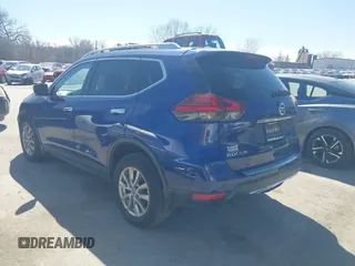2017 Nissan Rogue SV with VIN KNMAT2MT2HP580785, listed as a IAAI auction lot 41811204 with 134,987 mi miles. Bid and sale history available at carsss.com. Image 3.