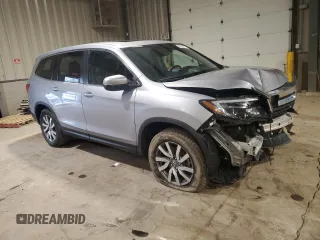 2022 Honda Pilot EX-L with VIN 5FNYF6H54NB006848, listed as a Copart auction lot 52632325 with 51,869 mi miles and Salvage Title. Bid and sale history available at carsss.com. Image 4.