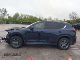 2017 Mazda CX-5 Touring z VIN JM3KFBCL4H0156571, wystawiony jako IAAI lot #42183562 z przebiegiem 135 595 mil mil oraz . Historia ofert i sprzedaży dostępna na DreamBid. Obrazek 15.