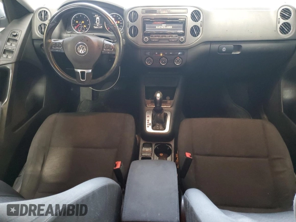 2013 Volkswagen Tiguan S with VIN WVGAV3AX9DW626065, listed as a Copart auction lot 58014145 with 128,858 mi miles and Salvage title. Bid and sale history available at DreamBid. Image 8.