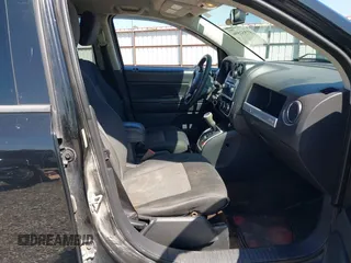 2014 Jeep Compass Sport with VIN 1C4NJCBA0ED510942, listed as a IAAI auction lot 41952596 with 196,030 mi miles and . Bid and sale history available at DreamBid. Image 5.