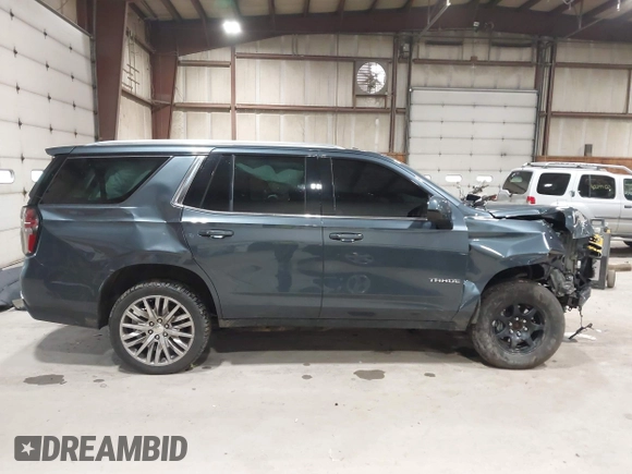 2021 Chevrolet Tahoe LT z VIN 1GNSKNKD5MR354265, wystawiony jako IAAI lot #42331890 z przebiegiem 106 250 mil mil oraz . Historia ofert i sprzedaży dostępna na DreamBid. Obrazek 14.