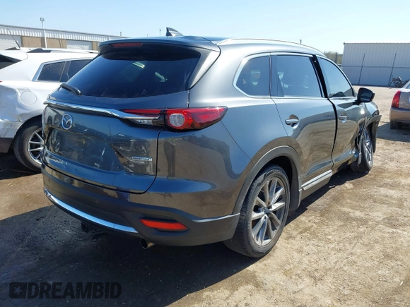 2020 Mazda CX-9 Signature with VIN JM3TCBEY9L0407955, listed as a IAAI auction lot 41984360 with 85,668 mi miles and . Bid and sale history available at carsss.com. Image 4.