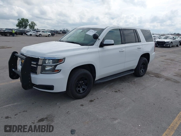 2018 Chevrolet Tahoe Commercial z VIN 1GNSKDEC8JR242164, wystawiony jako IAAI lot #42779273 z przebiegiem 134 654 mil mil oraz . Historia ofert i sprzedaży dostępna na DreamBid. Obrazek 2.