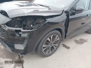 2022 Ford Escape SE with VIN 1FMCU0G6XNUB18144, listed as a IAAI auction lot 42390521 with 27,594 mi miles and . Bid and sale history available at DreamBid. Image 6.