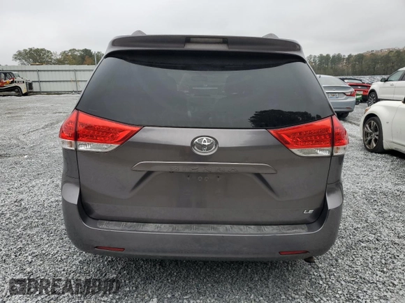 2012 Toyota Sienna with VIN 5TDKA3DC8CS009526, listed as a Copart auction lot 80279714 with 186,703 mi miles and Salvage Title. Bid and sale history available at DreamBid. Image 6.