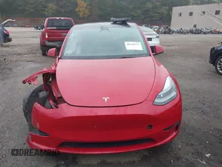 2023 Tesla Model Y Long Range with VIN 7SAYGAEE5PF685474, listed as a IAAI auction lot 40348773 with 26,605 mi miles and . Bid and sale history available at DreamBid. Image 12.