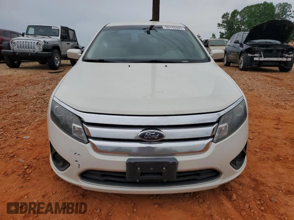 2012 Ford Fusion SE z VIN 3FAHP0HAXCR132060, wystawiony jako Copart lot #56148395 z przebiegiem 172 160 mil mil oraz Czysty tytuł • Clean title. Historia ofert i sprzedaży dostępna na DreamBid. Obrazek 5.