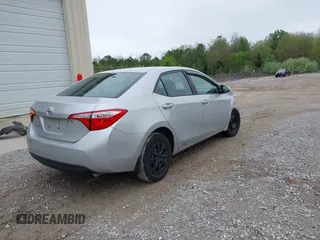 2016 Toyota Corolla L with VIN 5YFBURHE0GP496399, listed as a IAAI auction lot 41931774 with 113,842 mi miles and . Bid and sale history available at DreamBid. Image 4.