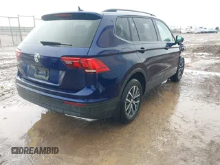 2021 Volkswagen Tiguan S with VIN 3VV1B7AXXMM002930, listed as a IAAI auction lot 42169613 with 47,118 mi miles and . Bid and sale history available at DreamBid. Image 4.