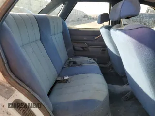 1986 Ford Tempo z VIN 1FABP22X4GK263512, wystawiony jako Copart lot #50618855 z przebiegiem 392 265 mil mil oraz Tytuł czysty. Historia ofert i sprzedaży dostępna na DreamBid. Obrazek 10.