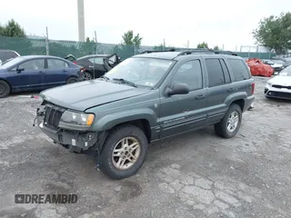 2004 Jeep Grand Cherokee Laredo with VIN 1J4GW48S24C276284, listed as a IAAI auction lot 42596655 with 142,524 mi miles and . Bid and sale history available at DreamBid. Image 2.