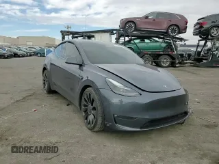 2022 Tesla Model Y Performance with VIN 7SAYGDEF1NF491967, listed as a Copart auction lot 51119515 with 50,520 mi miles and Salvage title. Bid and sale history available at DreamBid. Image 11.
